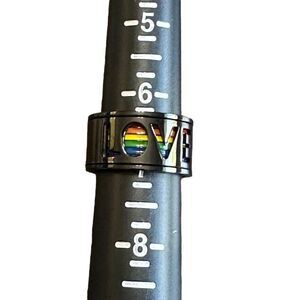 NWOT Size 7 Titanium “LOVE” spinner/fidget band with rainbow flag
